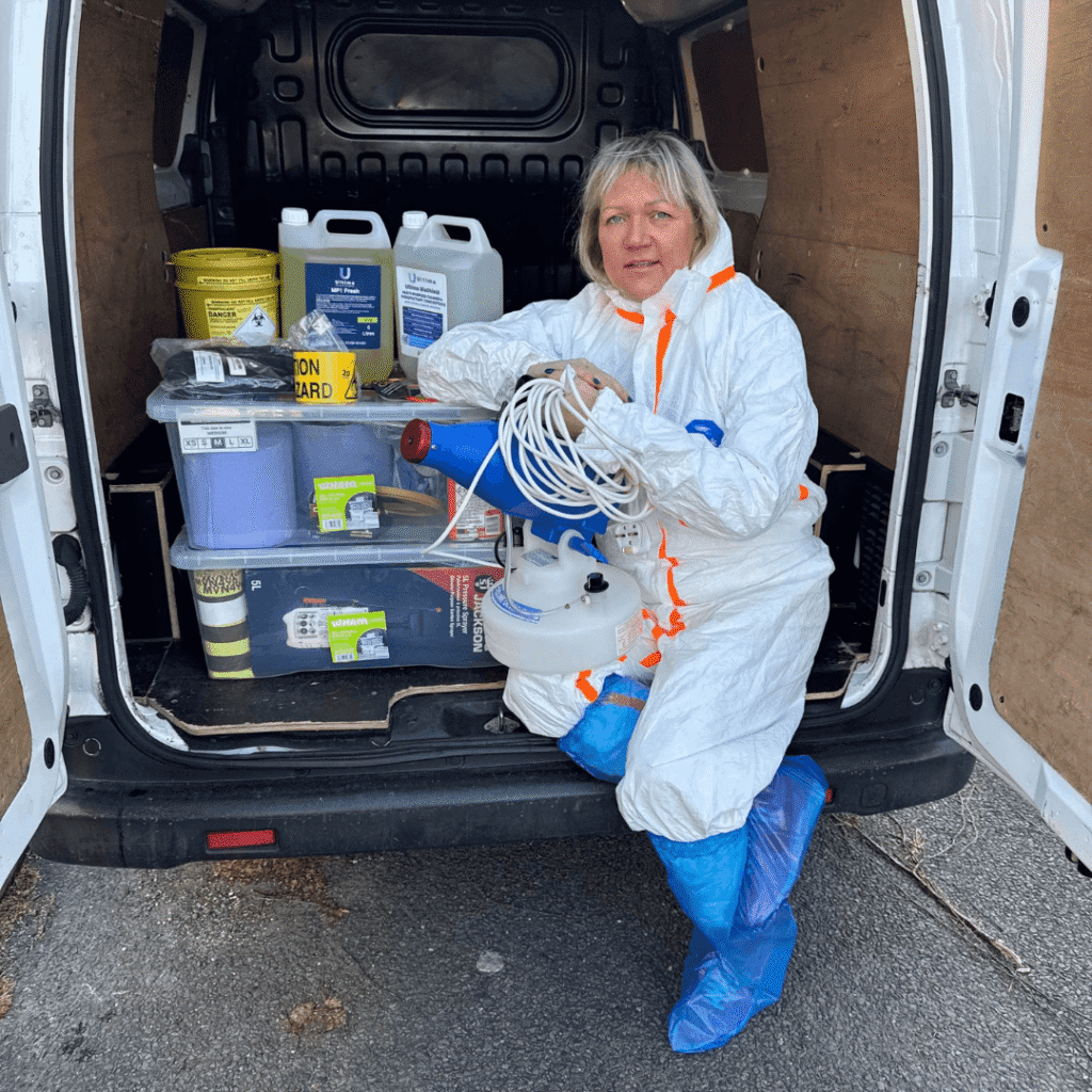owner of tangerine exteme cleans sitting in the company van