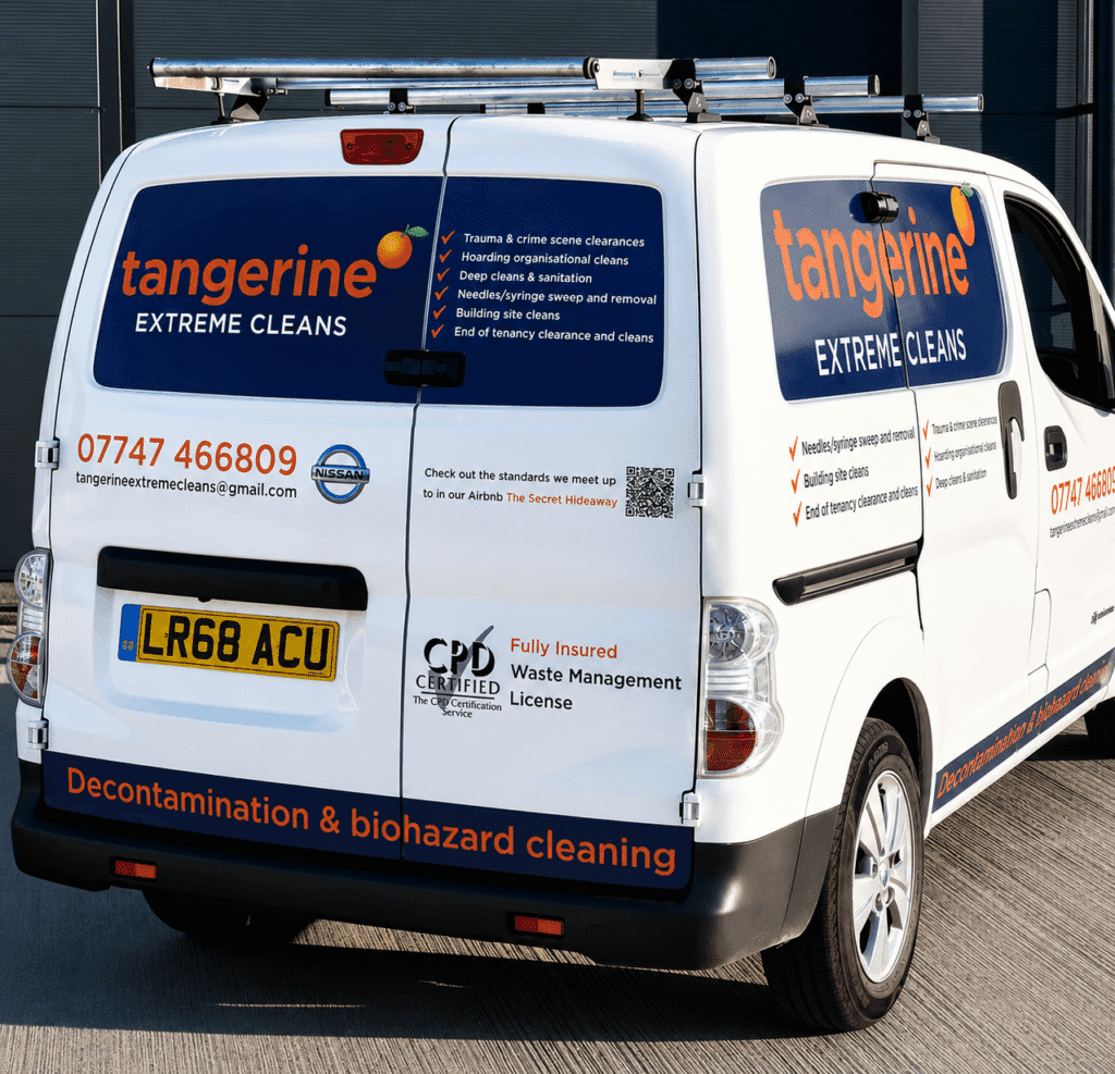 Tangerine Extreme Cleans branded company van parked outside commercial premises, showcasing specialist trauma, biohazard, hoarding and deep cleaning services.